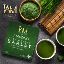 Load image into Gallery viewer, Amazing Pure Organic Barley drink mix packaging with green powder and tea on a dark surface.
