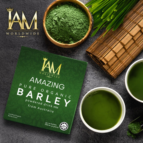 Amazing Pure Organic Barley drink mix packaging with green powder and tea on a dark surface.