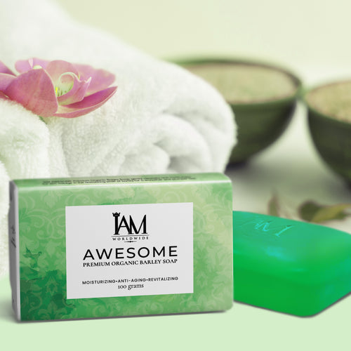 Green bar of soap with 'IAM' branding on a white background